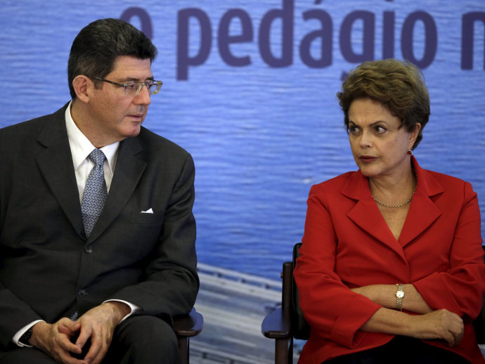 O ministro da Fazenda Joaquim Levy e a presidente Dilma Rousseff durante assinatura do contrato de concessão da ponte Rio-Niteroi, em cerimônia no Palácio do Planalto O ministro da Fazenda Joaquim Levy e a presidente Dilma Rousseff durante assinatura do contrato de concessão da ponte Rio-Niteroi, em cerimônia no Palácio do Planalto